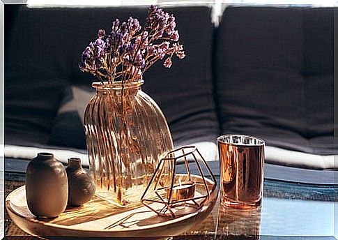 Vase with violet flowers