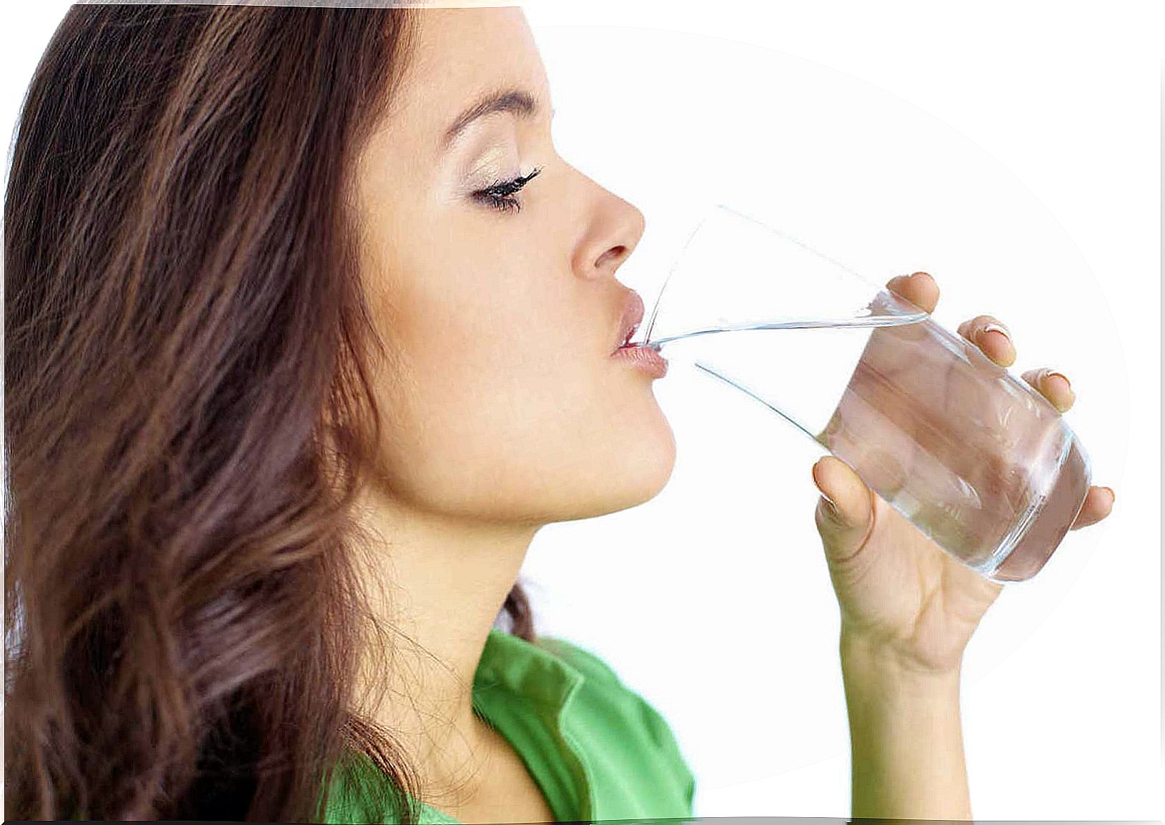 Woman drinking artichoke water.