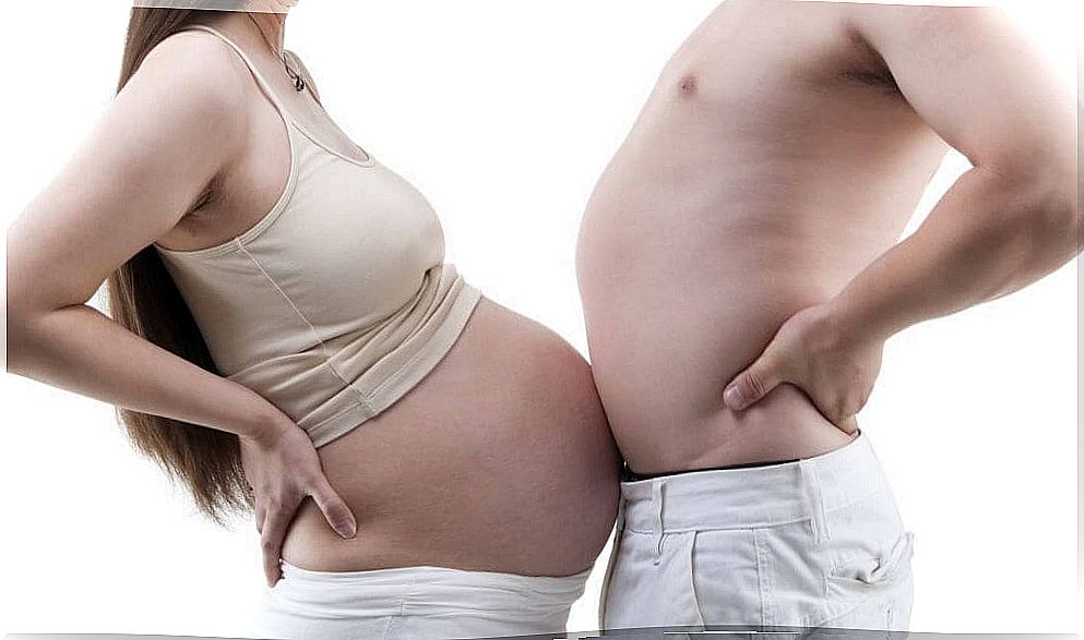 Pregnant woman and man with pregnancy symptoms