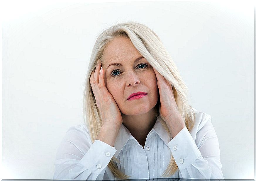 Woman with menopause looking at camera