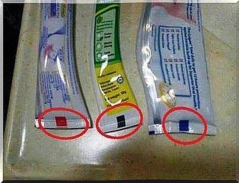 What does the color mark on the toothpaste tube indicate?